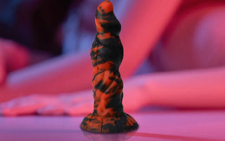 The positioning of the unicorn's dildo